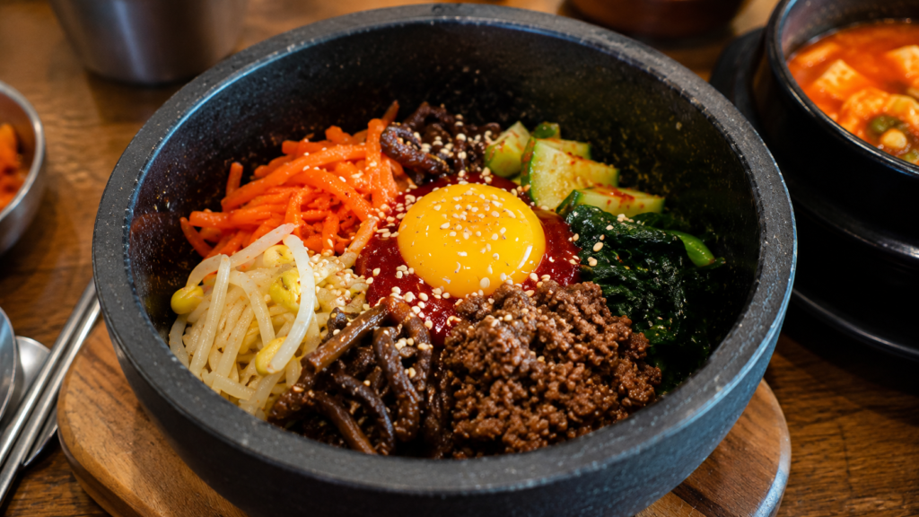 Traditional Korean bibimbap with vegetables and egg