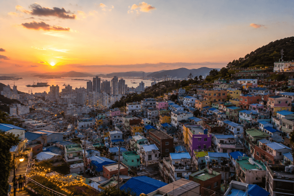 Sunset over Gamcheon Culture Village and Busan skyline