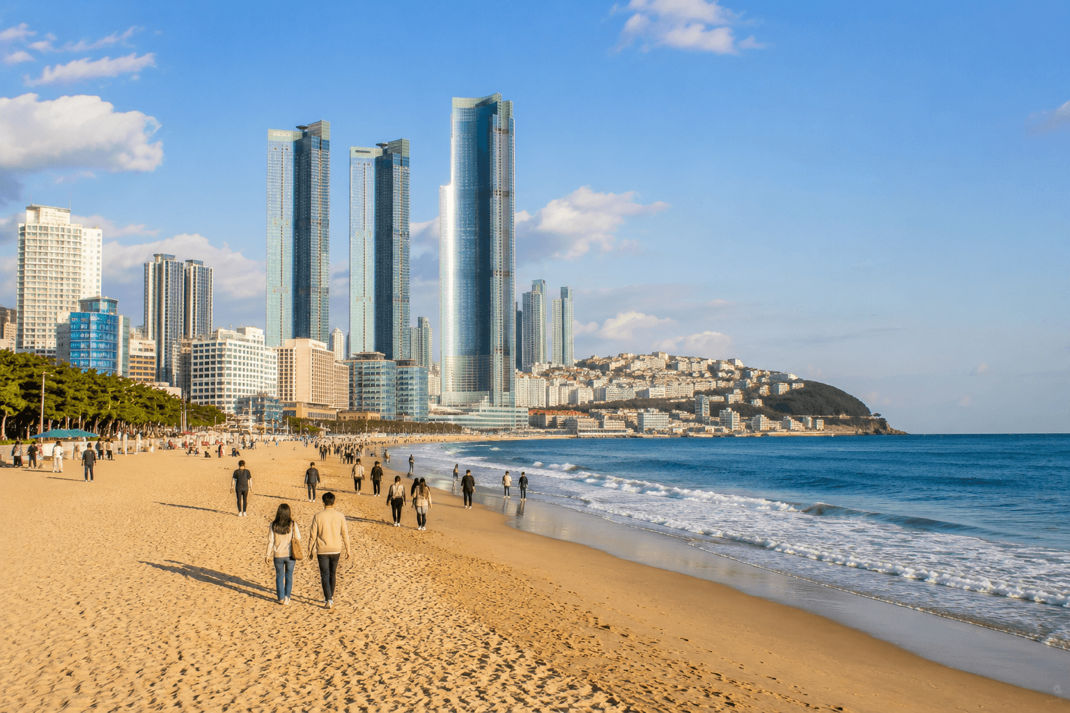 Haeundae Beach in Busan with golden sand, ocean waves, modern skyline, and relaxed beach atmosphere