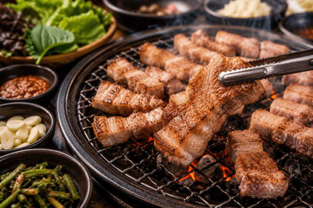 Jeju Black Pork BBQ Charcoal grilled Jeju black pork barbecue with Korean side dishes