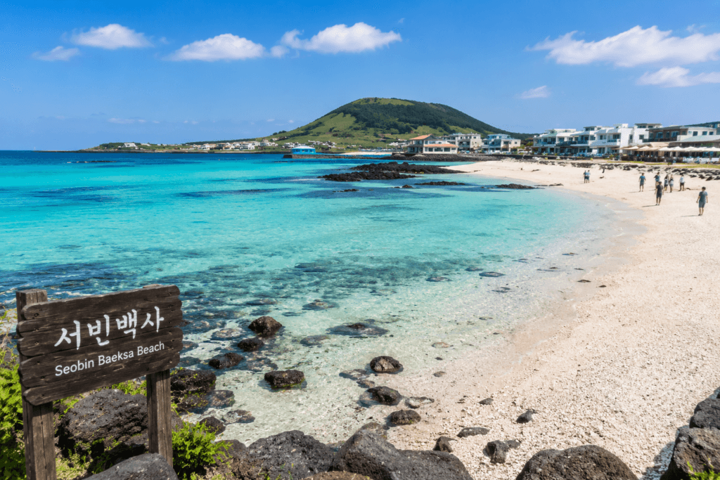 Seobin Baeksa Beach with white coral sand and turquoise water on Udo Island