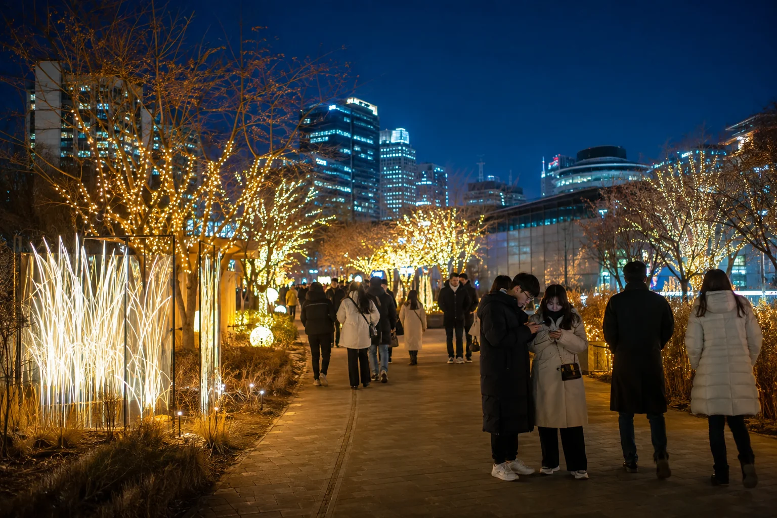 Travelers walking through a softly illuminated Seoul winter festival at night
