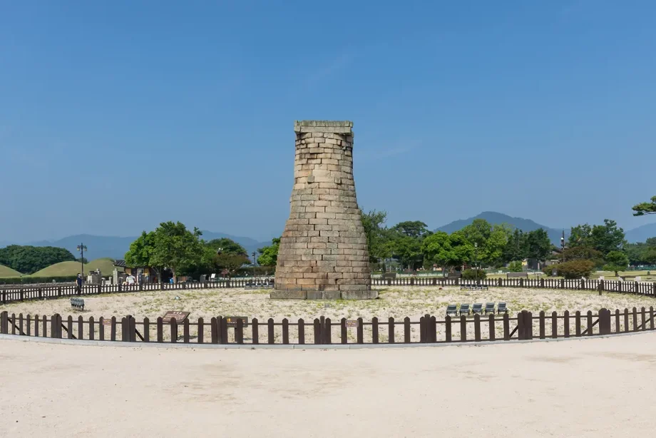 Cheomseongdae Observatory and its stonework under a blue sky in Gyeongju